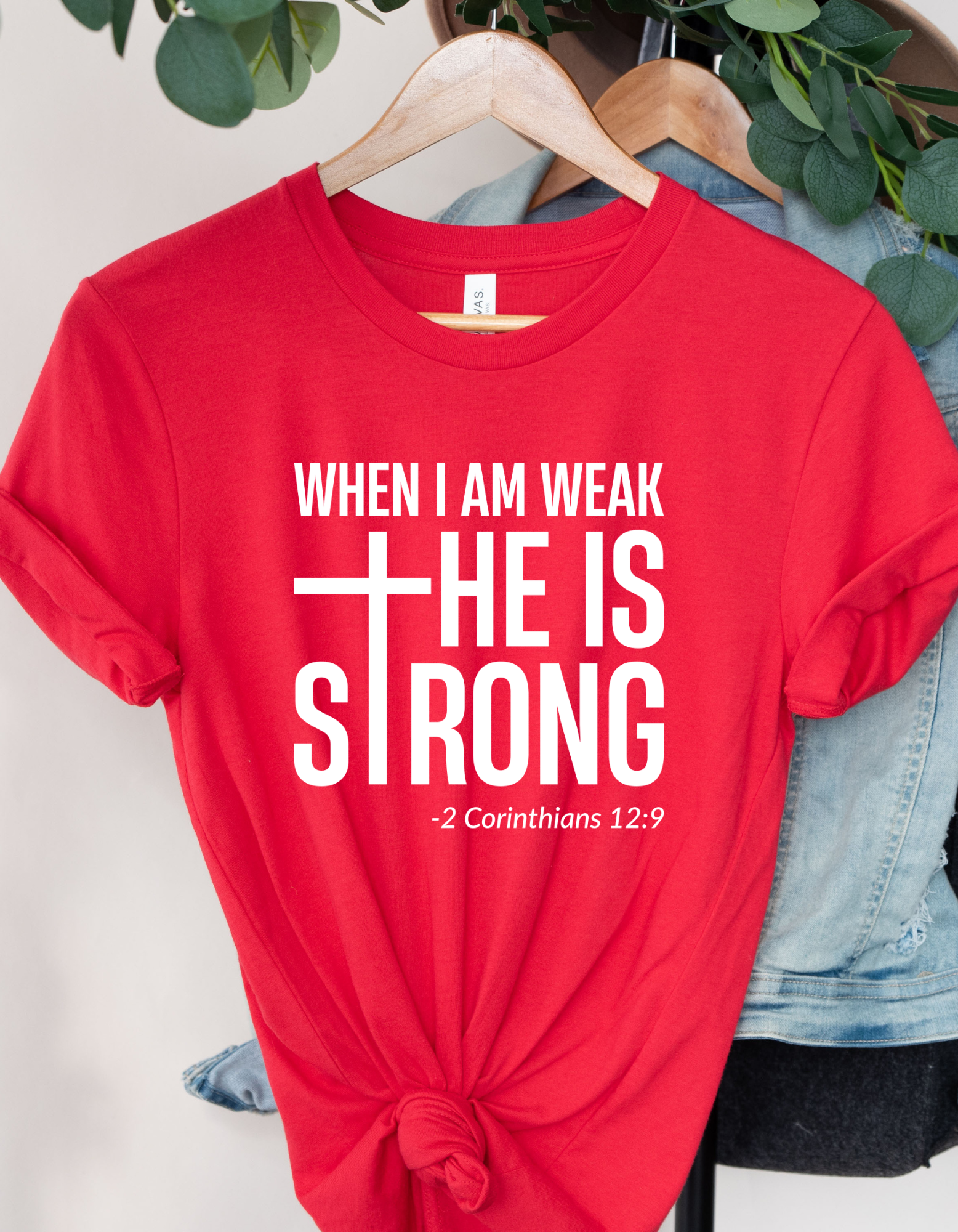 When I am Weak He is Strong Women’s Short Sleeve Graphic Tee