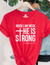 When I am Weak He is Strong Women’s Short Sleeve Graphic Tee