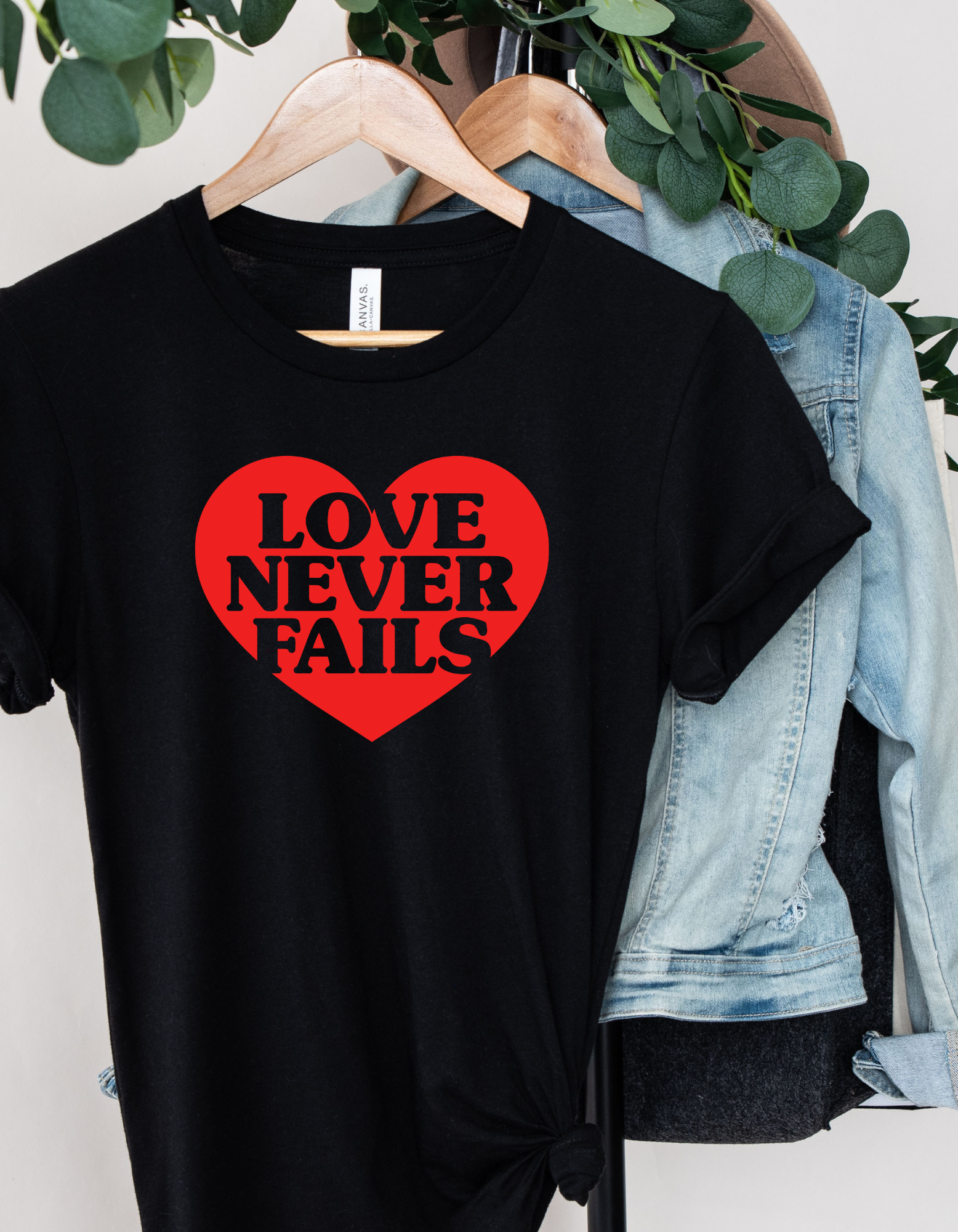 Love Never Fails Women Short Sleeve Graphic Tee