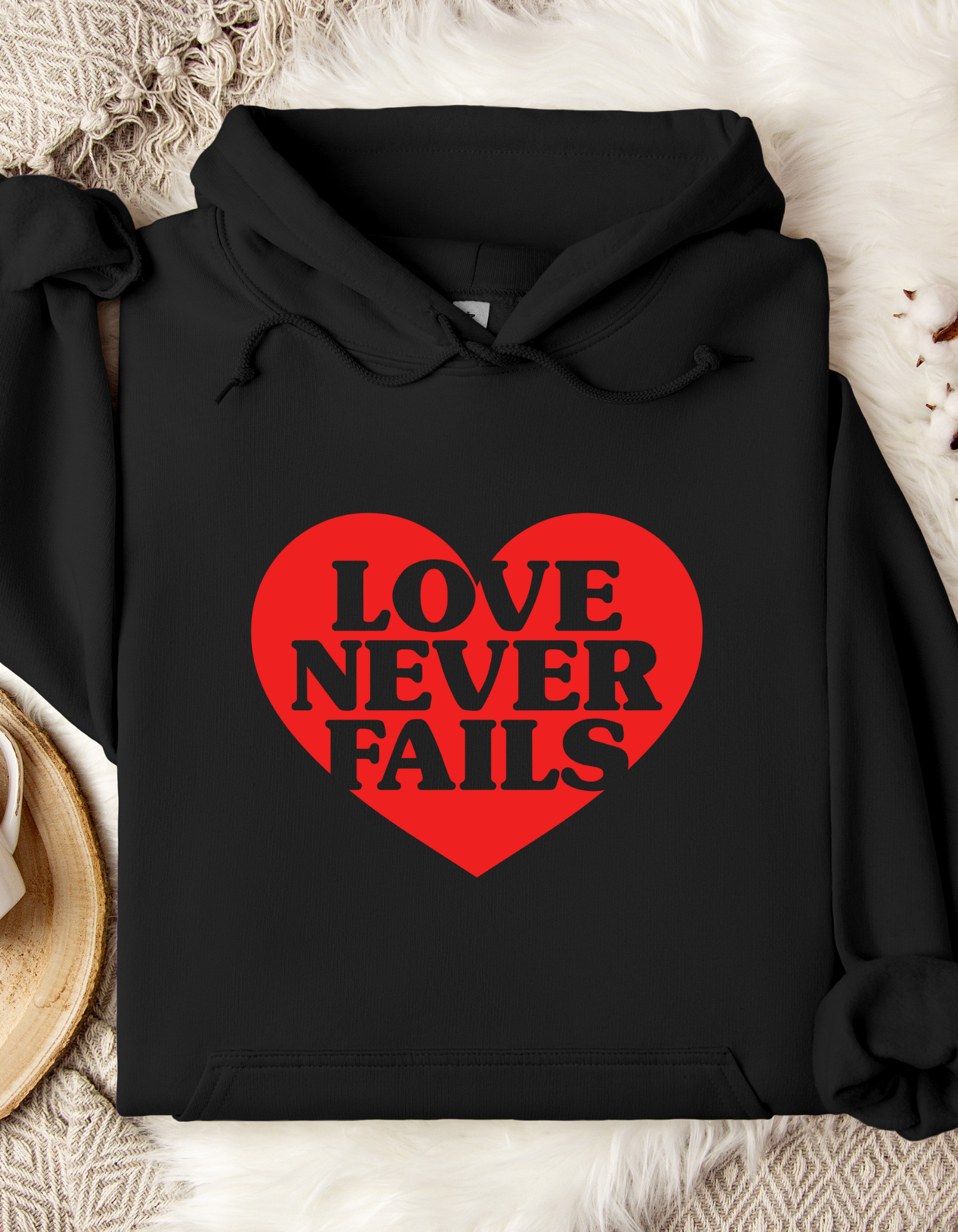 Love Never Fails Hooded Sweatshirt